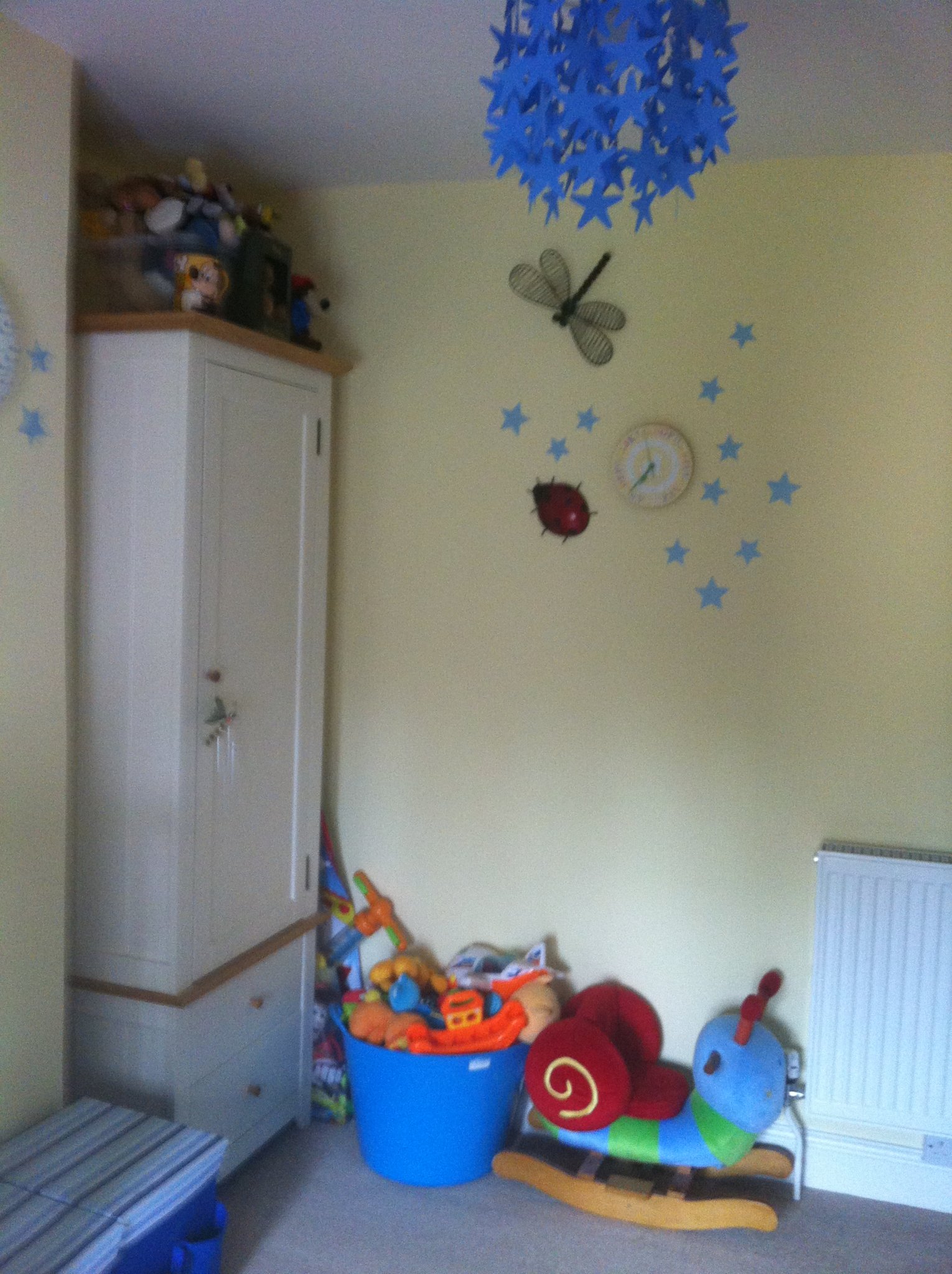 Nursery corner with painted cupboard