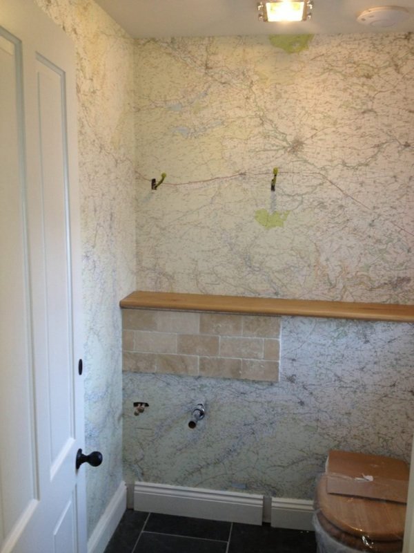 Map print wallpaper around a window