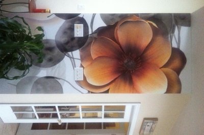 Large flower mural above a window