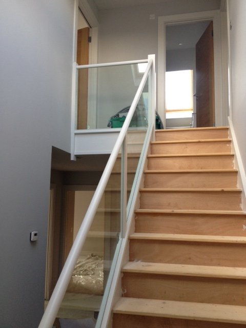 Glass balustrade staircase in a modern home