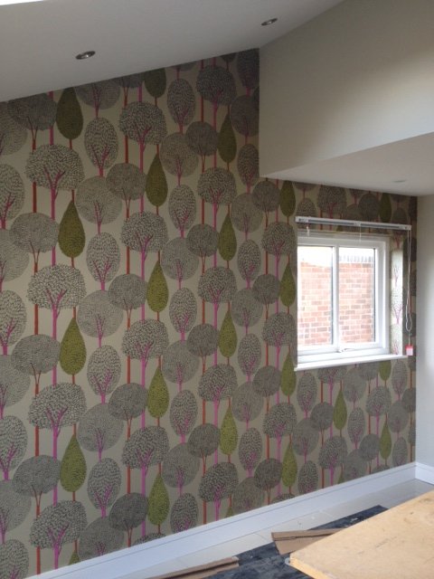 Tree pattern designer wallpaper on a feature wall
