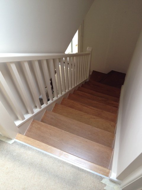 White staircase with oak treads